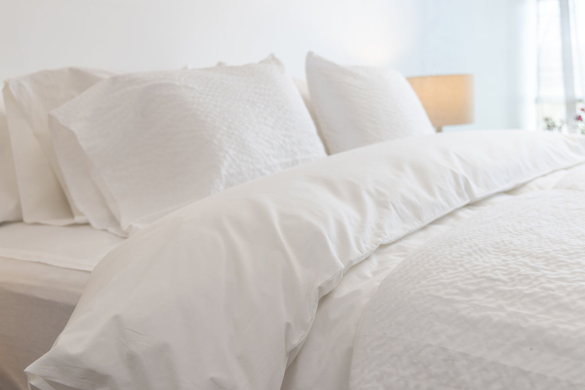 Airy bedroom with white ComfortCore Cumulus and Percale bedding