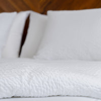 This is a close-up photo highlighting ComfortCore Cumulus weave - a bubbled, seer-sucker style te...