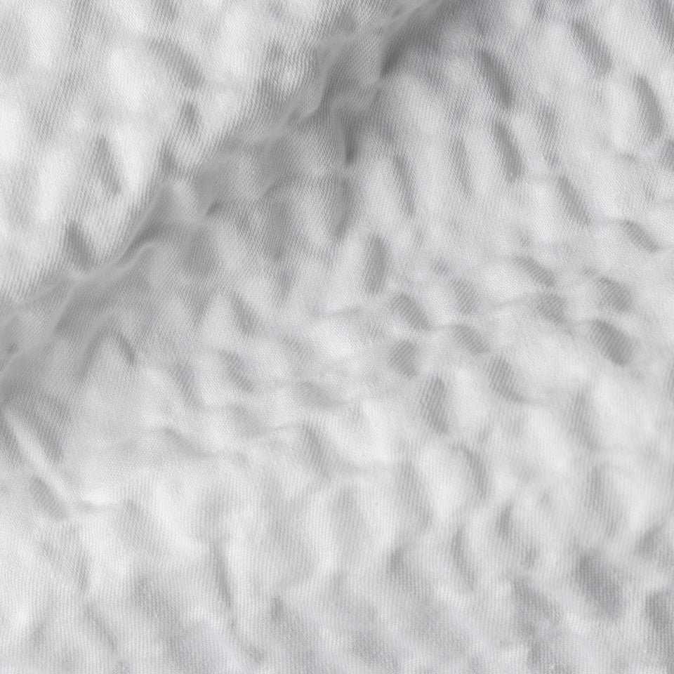 Close-up of white ComfortCore Cumulus fabric